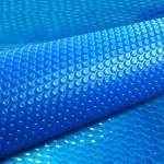 Pasokan pabrik mengambang persegi panjang persegi panjang yang dapat ditarik penutup kolam renang pvc yang aman dan ramah lingkungan penutup surya kolam renang